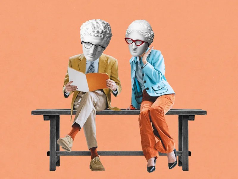 Two people on a bench against an orange background, one reading a booklet while the other leans in to listen, with classical statue heads in place of their own