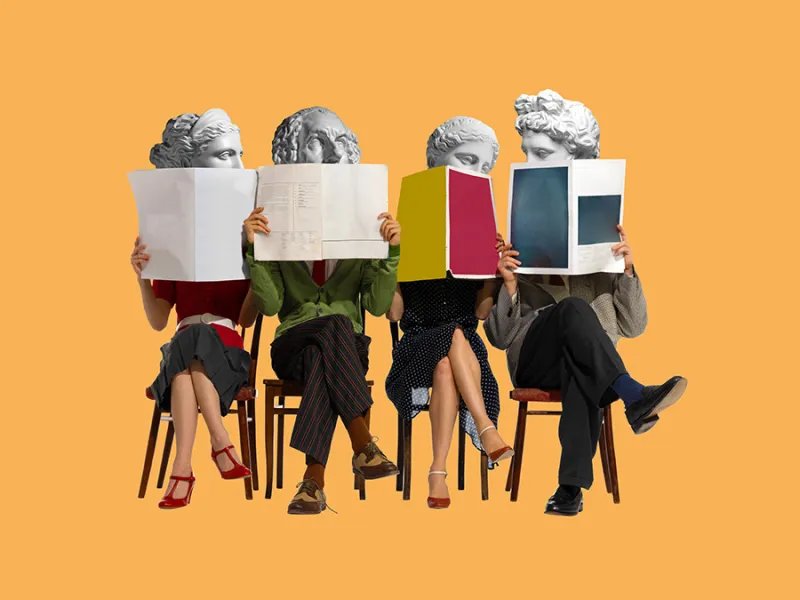 Four people seated in a row on an orange background, faces hidden behind open magazines, with classical statue heads in place of their own